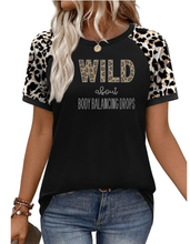 Load image into Gallery viewer, Partner.co Bling | Wild About Body Balancing Drops | BLING Women's Ragland Short Sleeve Leopard Cheetah Shirt
